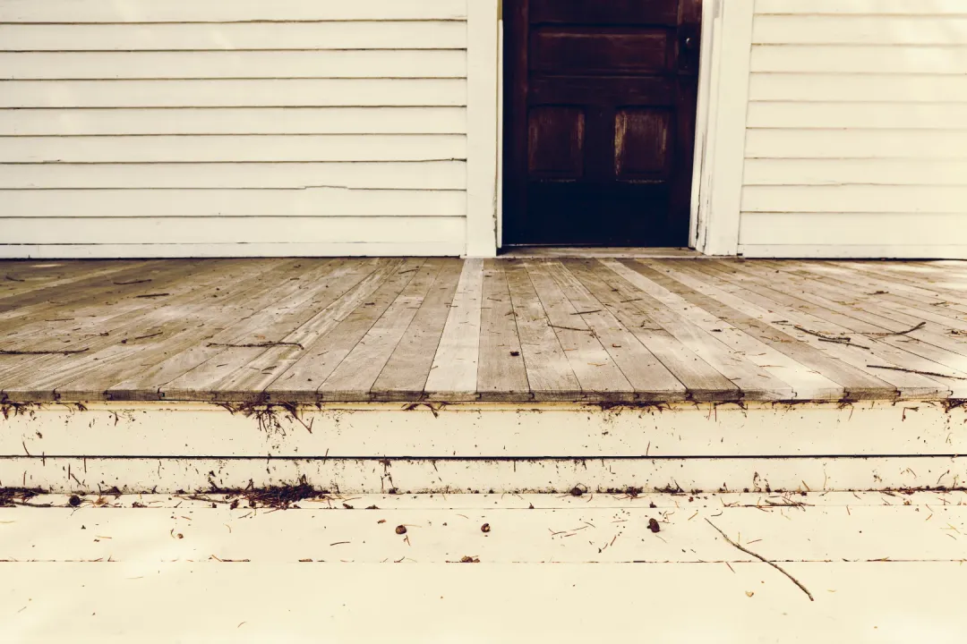 A dirty Deck entrance of a house