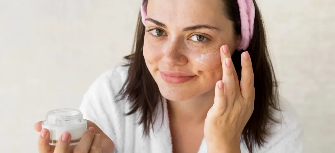 medium shot woman using face cream - Can Tretinoin Cause Acne? A Simple Guide - Palm Beach Dermatology Group